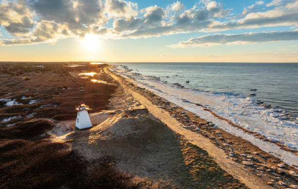 istock St Peter's Bay Harbour Lighthouse at golden hour 2197447817