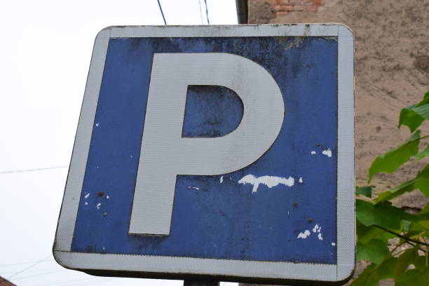 istock weathered old parking lot sign 2197449820