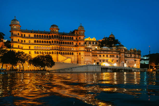 istock City Palace in Udaipur Enlightened During a Starry Evening Beside Calm Waters 2197450917