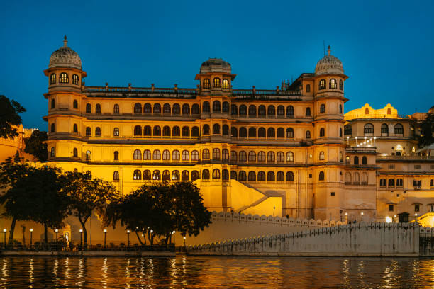 istock Illuminated City Palace in Udaipur Reflecting on Calm Waters 2197451076