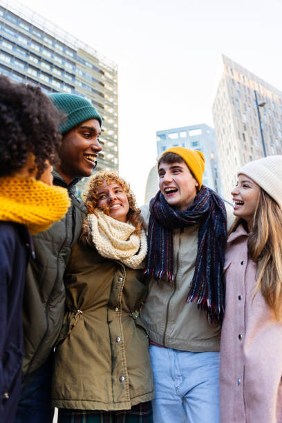 istock Diverse group of young friends having fun together outdoors in winter 2197452637