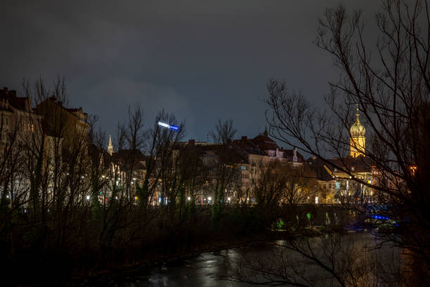 Cloudy night from hill with old tower in winter cold evening in Graz Austria 02 01 2025