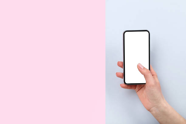 istock Smartphone in female hand on colorful background 2197458568