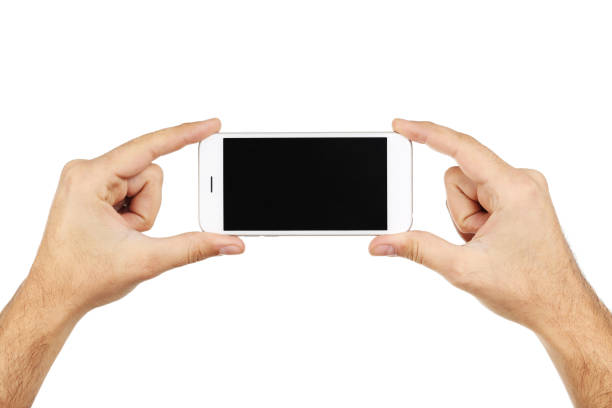 istock Male hands holding smartphone on white background 2197461635
