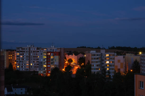 istock Nighttime Cityscape with Illuminated Apartments 2197462491