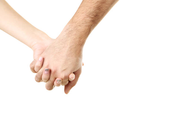 Female and male hand holding each other on white background