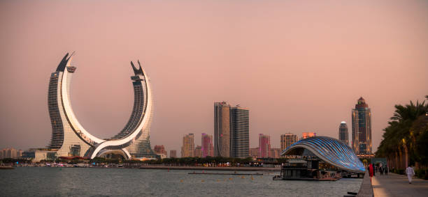 Lusail, Qatar - November 30, 2024: Katara buildings view from Lusail Marina Park. Great view with Crescent Tower