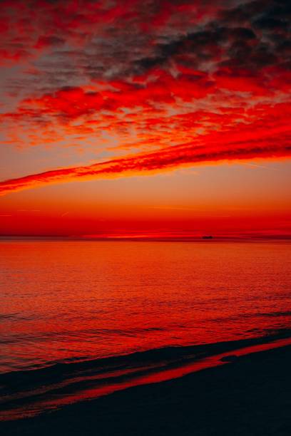istock Breathtaking sunset over ocean with vibrant hues. 2197465103