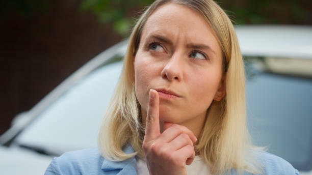 istock Confused puzzled Caucasian female owner driver woman thinking idea car problem car breakdown wonder pensive auto buyer deciding in city business businesswoman contemplate automobile girl ponder dream 2197465615