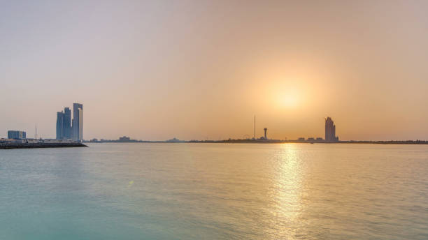 istock Sunset in Abu Dhabi over Marina Island timelapse 2197465702