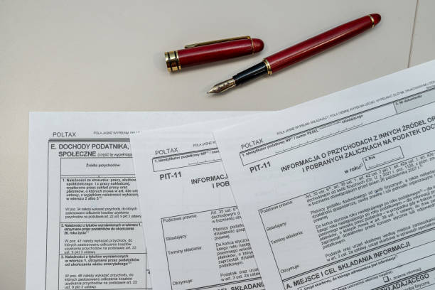 istock polish tax forms pit 11 with pen on office table. Accounting concept. 2197468866