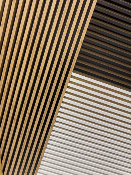 istock modern wall paneling with vertical wooden lath stripes on home decoration 2197469484