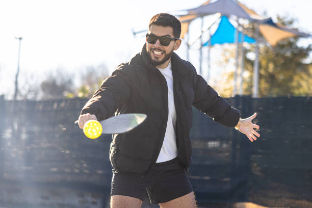 istock Hispanic friends playing pickleball 2197474686