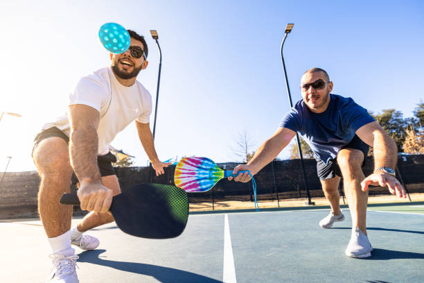 istock Hispanic friends playing pickleball 2197474977