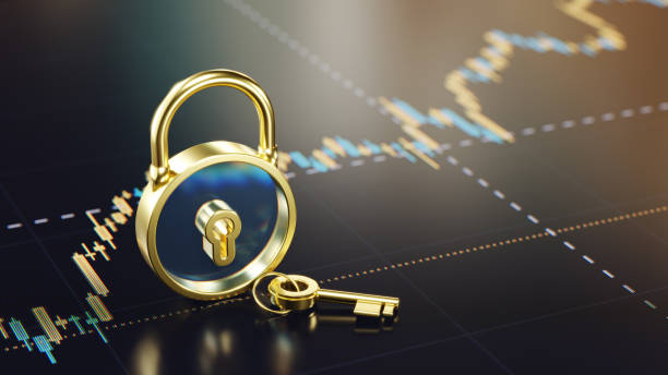 istock 3d Golden Lock with a Key on Digital Display with Financial Graph Background 2197475011