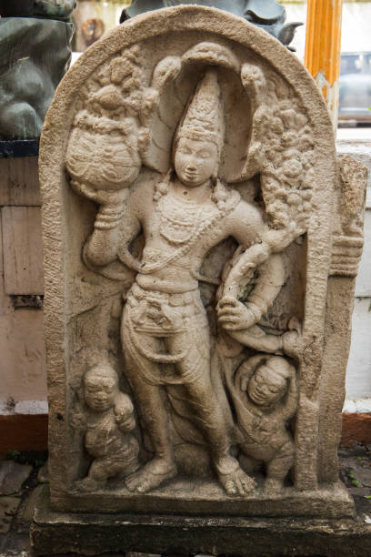 istock Ancient stone statue at Gangaramaya Temple 2197477994
