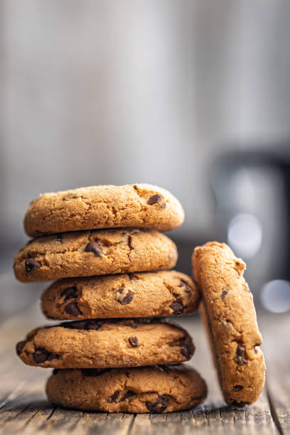 Chocolate chip cookies on wooden table.