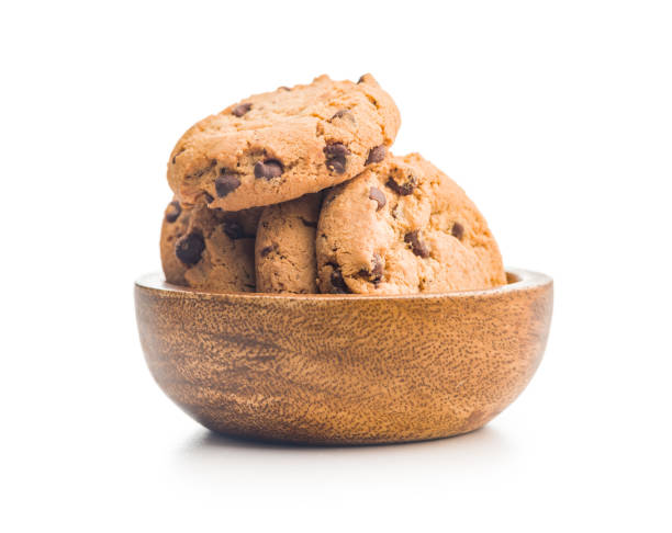 istock Chocolate chip cookies in bowl isolated on white background. 2197478337