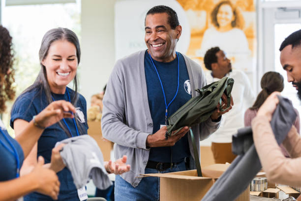 istock Volunteers Sorting Donations at a Community Center 2197479736