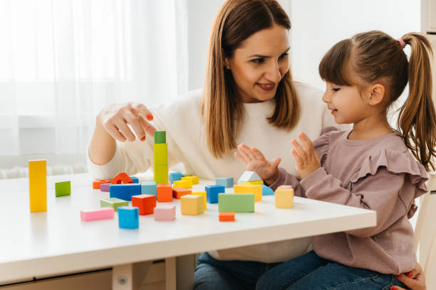 istock Mother and Daughter Enjoying Creative Playtime with Blocks 2197482206
