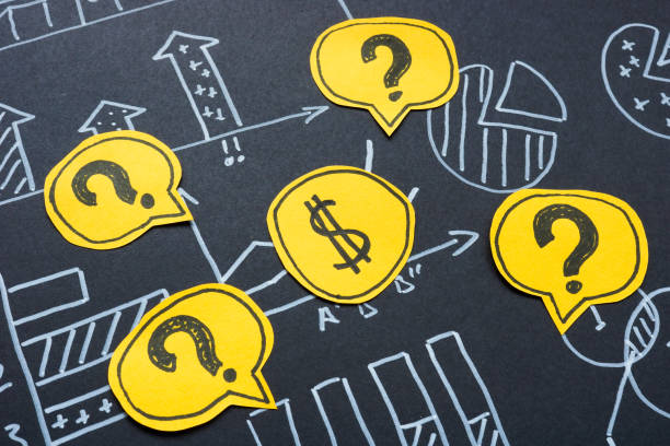 istock Question marks around a dollar. Financial investments and economic uncertainty. 2197482571