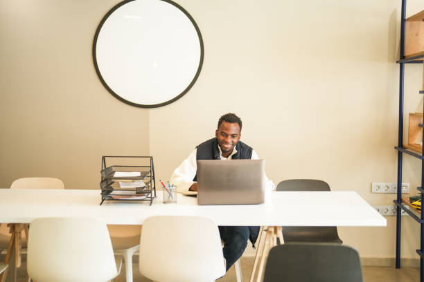 istock african american man working on laptop in office 2197484169