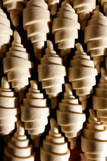 istock Deliciously Freshly Shaped Croissants Awaiting Their Time in the Oven Ready for Baking 2197488026