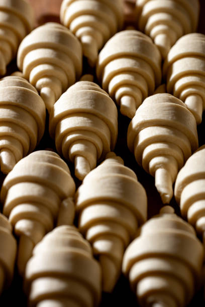 istock Deliciously Freshly Shaped Croissants Awaiting Their Time in the Oven Ready for Baking 2197488042