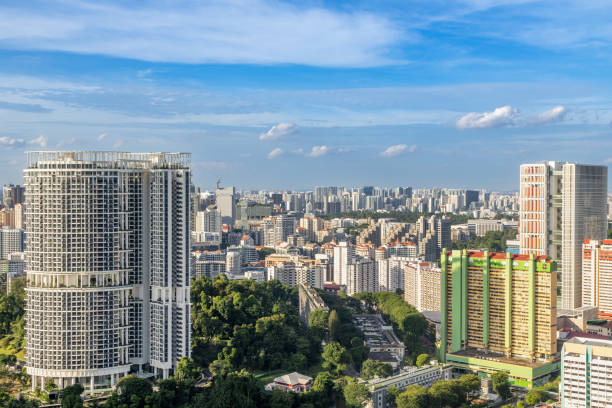 istock Modern developing residential district with tall skyscrapers and green park in the foreground, Singapore 2197488494