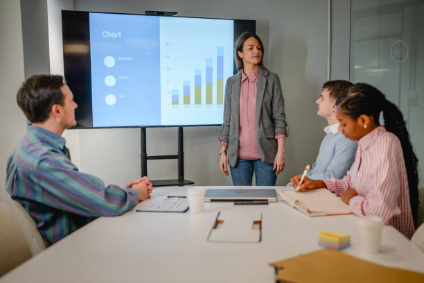 istock manager analyst holds meeting presentation for a team of economists 2197489975