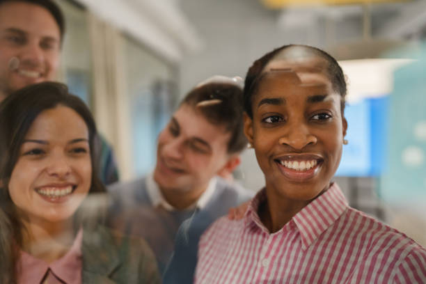 istock Diverse group of businesspeople brainstorming with sticky notes 2197491681