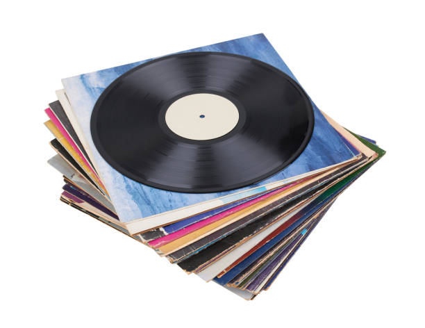 istock Vinyl record on a stack paper envelopes. Analog sound. Classic audio. Isolated on white 2197498176