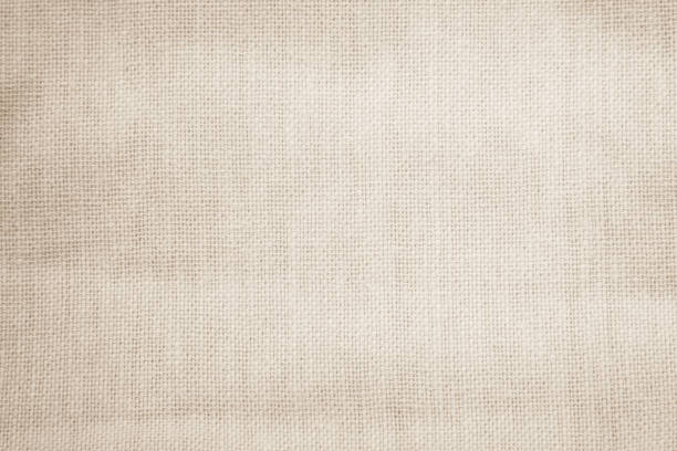 istock Brown sackcloth woven texture background in natural pattern. Jute hessian burlap, linen background in light beige cream color blank. Weaving canvas fiber line cotton cloth textured as organic. 2197503336