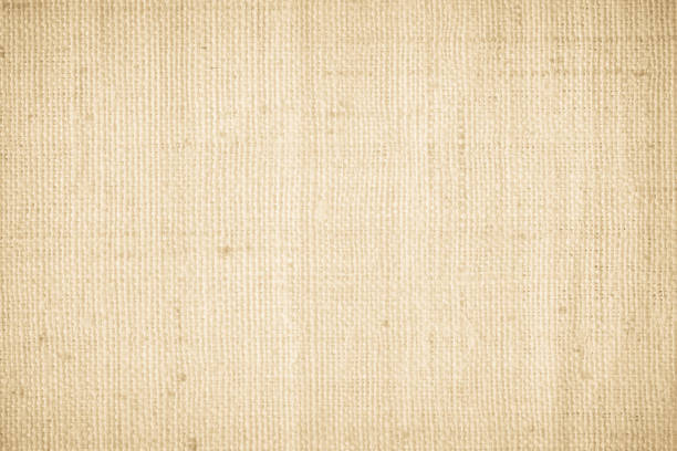 Brown sackcloth woven texture background in natural pattern. Jute hessian burlap, linen background in light beige cream color blank. Weaving canvas fiber line cotton cloth textured as organic.