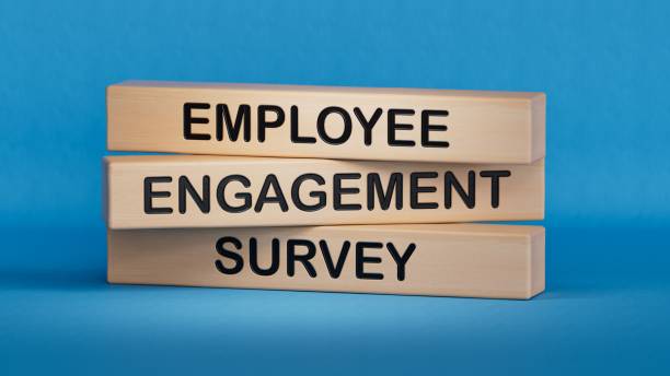 istock Employee Engagement Survey. Wooden cube blocks. Copy space.3D rendering on blue background. 2197503752