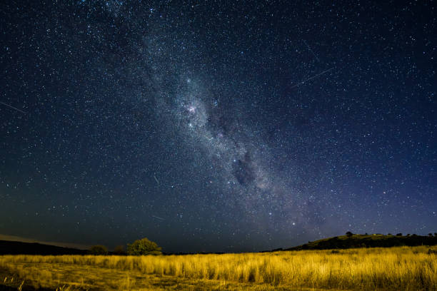 istock The night sky and Milky Way Galaxy with satellites 2197503821