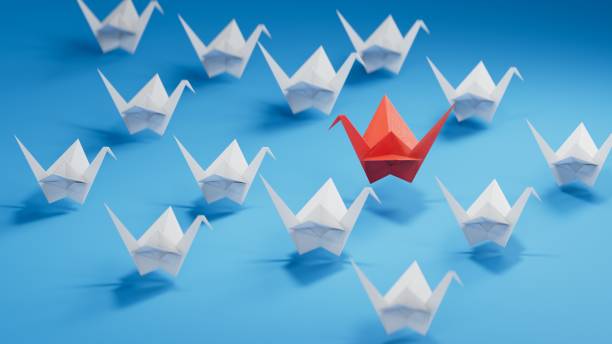 istock Differentiation concept with paper swans.new ideas. paper art style. creative idea.3D rendering on blue background. 2197503894