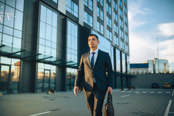 istock Confident lawyer standing tall in the business district. 2197504023