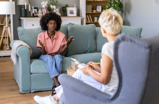 istock Sad woman talking to a councillor 2197517867