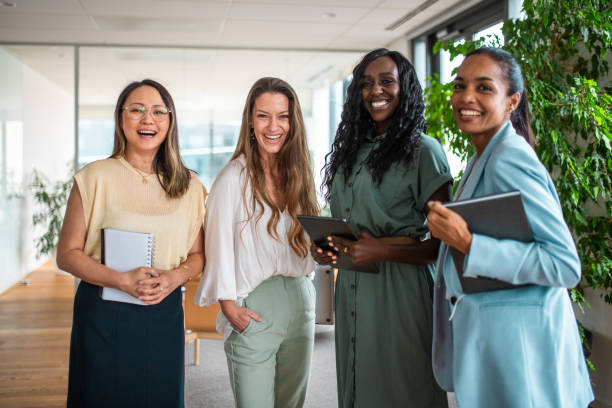 istock Diverse Businesswomen with Digital Tablets in Modern Workspace 2197517965