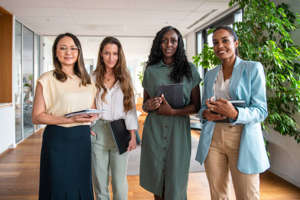 istock Diverse Female Executives in Modern Office Space 2197517972