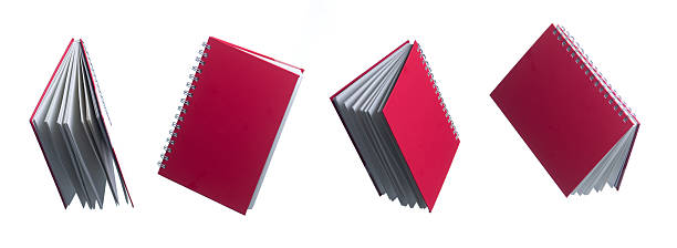 istock Floating Book,Book is opened and flying through the air isolated on white 2197518031