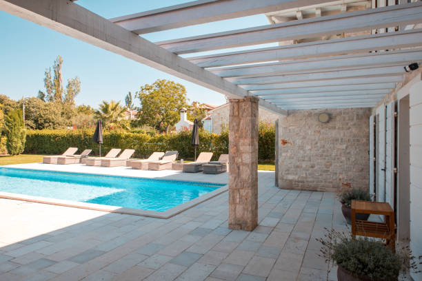 istock Elegant Pool on Stone-Paved Patio 2197518444