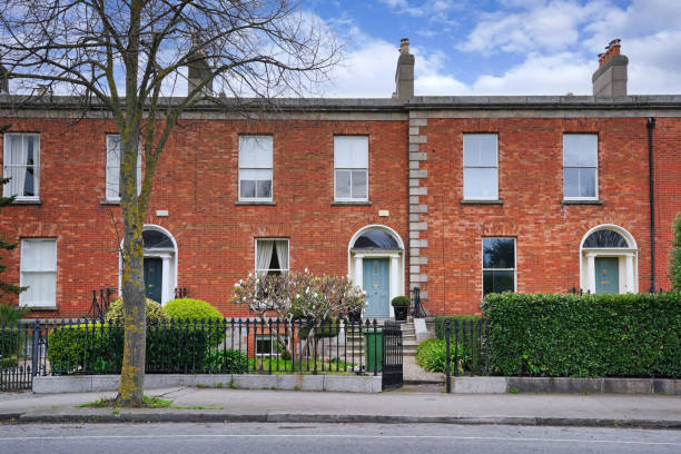 istock Row of brick townhouses 2197518668