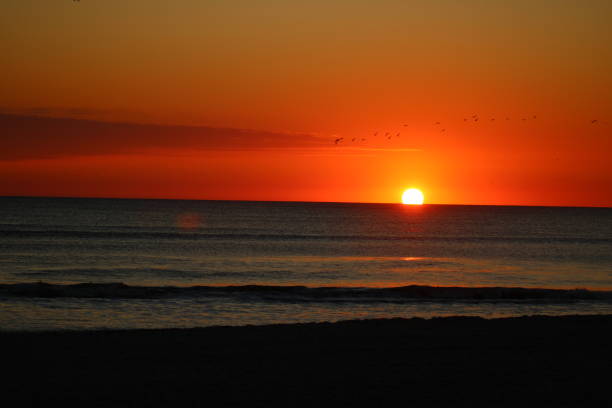 istock Morning sunrise at the beach in Florida 2197520015