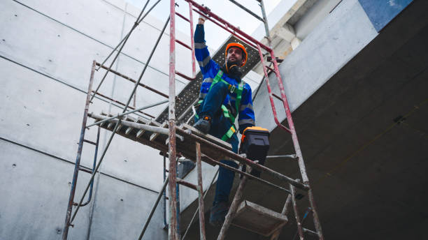 istock Engineers walking up the staircase in a building site. 2197523840