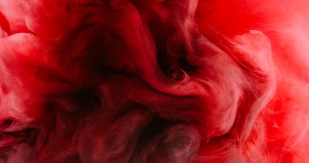 istock Color smoke cloud ink water swirl red haze blend 2197528309