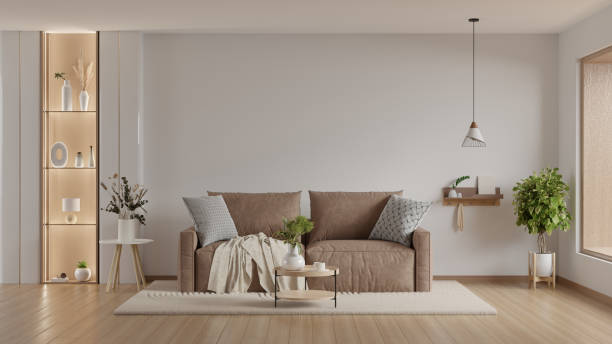 istock Living room interior with mocha brown mousse sofa and decor on empty white color wall background- 3D rendering 2197529243