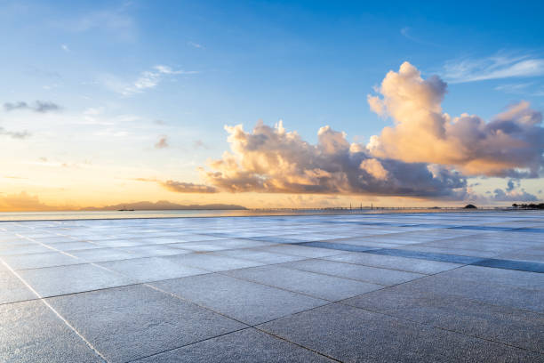 istock Empty square floor and beautiful coastline with sky clouds nature landscape at sunrise 2197530349