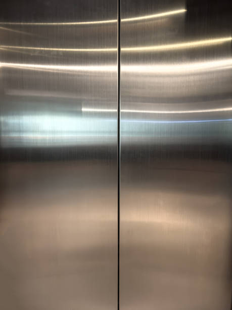 istock Stainless steel texture plate of elevator door. 2197532959